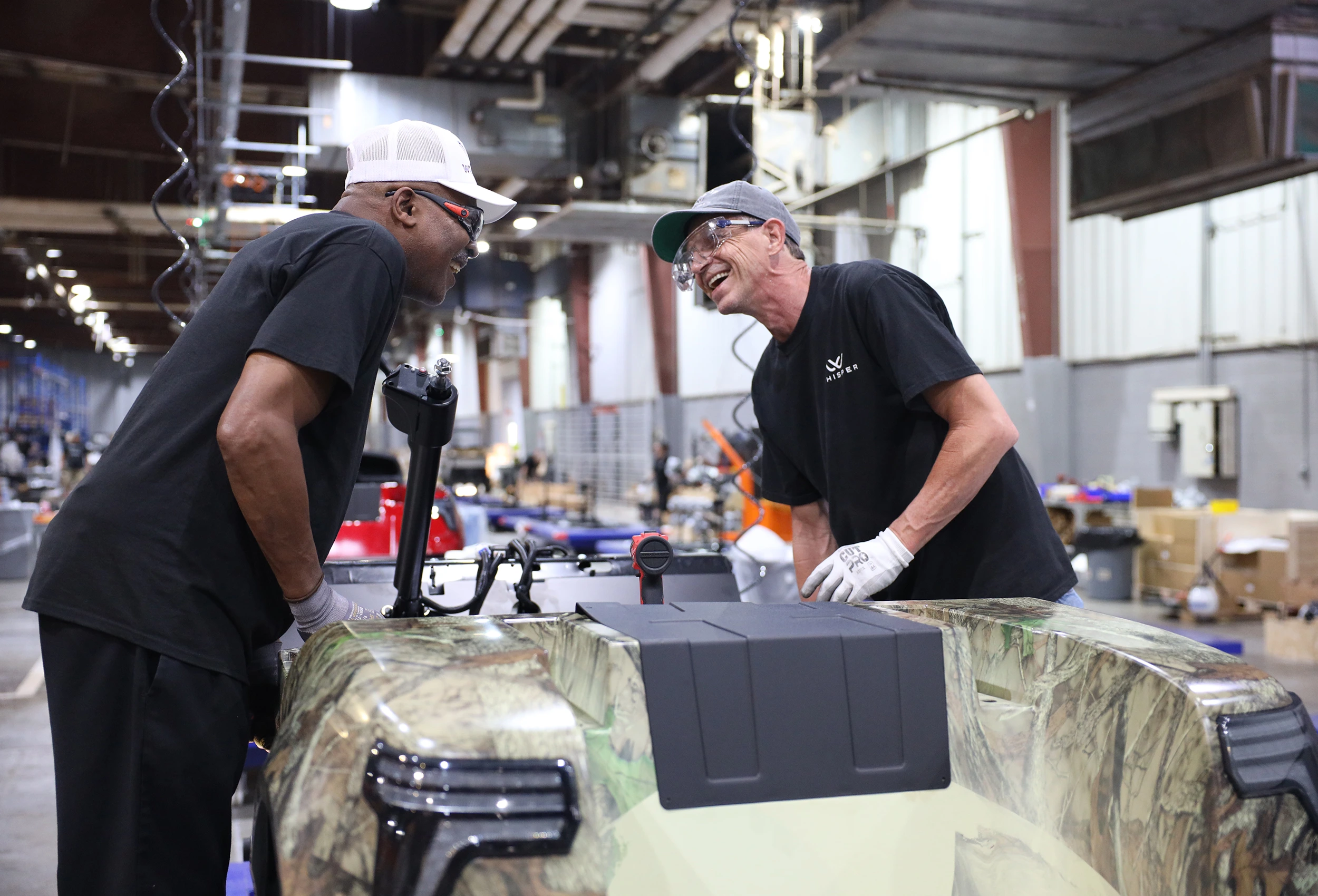 Whisper's staff in the manufacturing assembling line